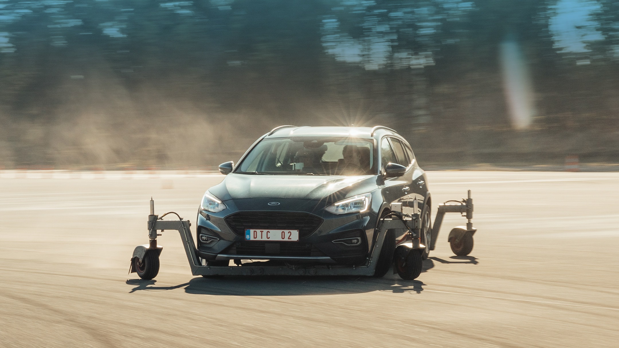 Man putting a bicycle into the trunk of the car